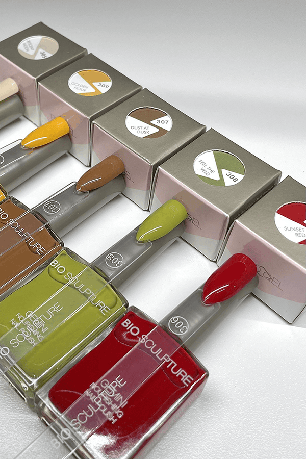 Several bottles of Gemini nail polishes in different colors